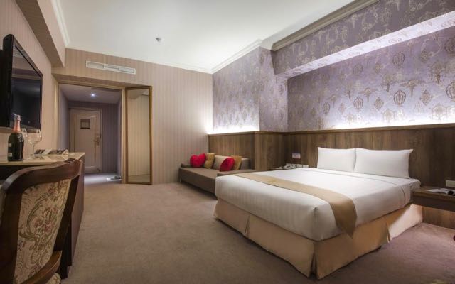 皇家尊龍大酒店照片： 房間